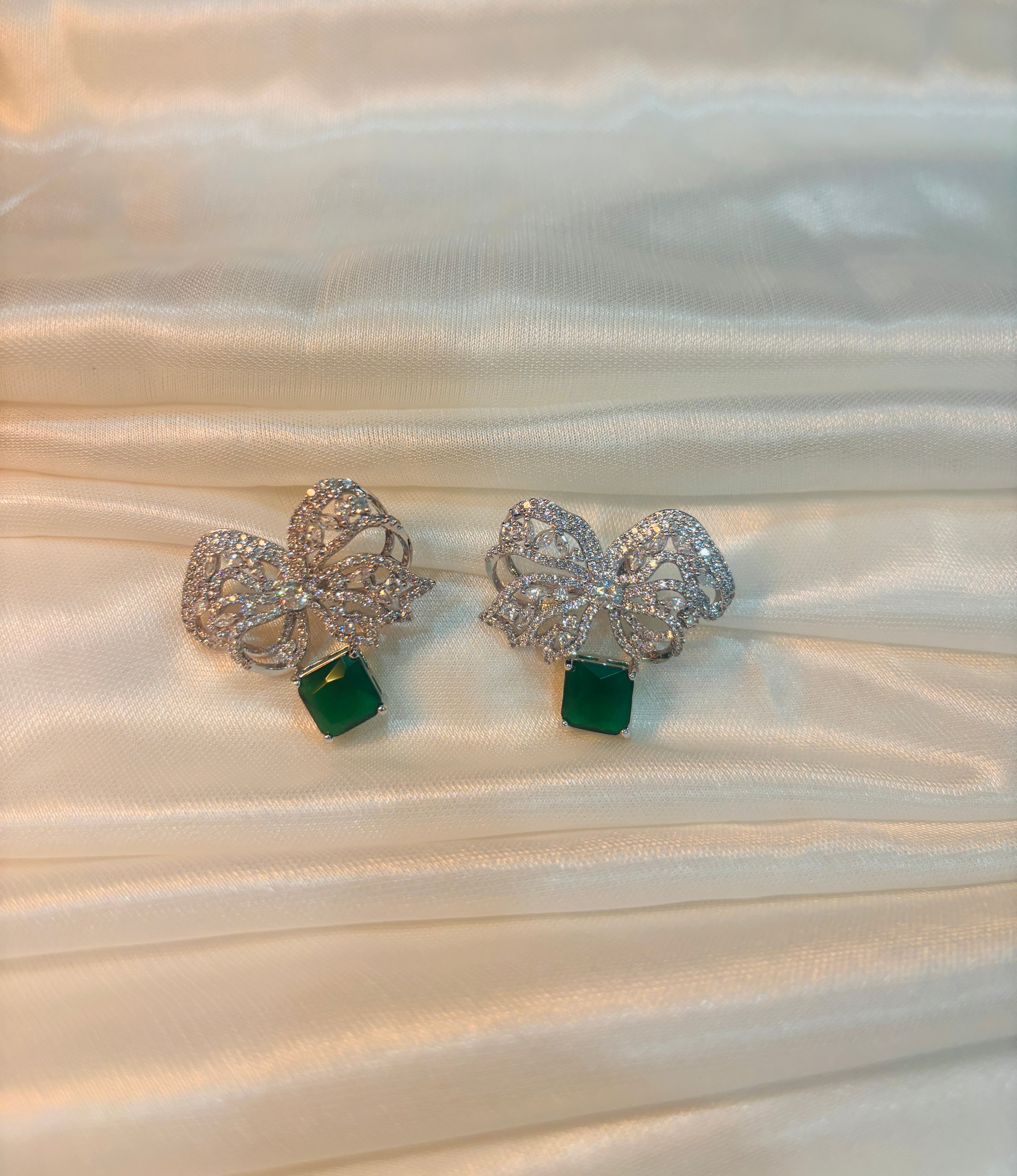 Emerald Bow Drop Earrings – Luxe CZ Statement Studs for Evening Wear